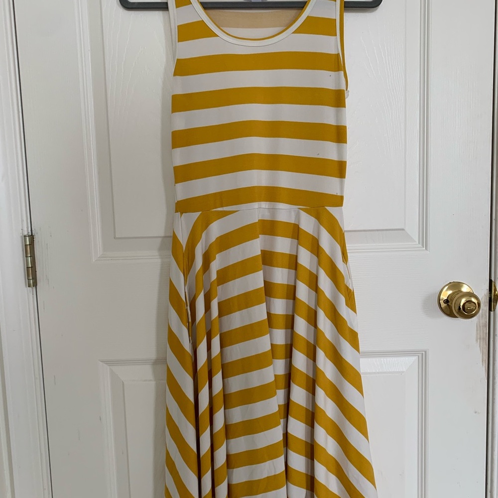 Lularoe Nikki sleeveless a-line dress pockets 94% polyester 6% spandex